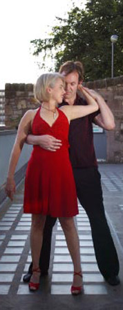 Lloyd and Carol Ann sharing a comb move outside Dancebase