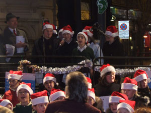 Leith Cllr. Gordon Munro watches the Choir of St. Mary's Primary School