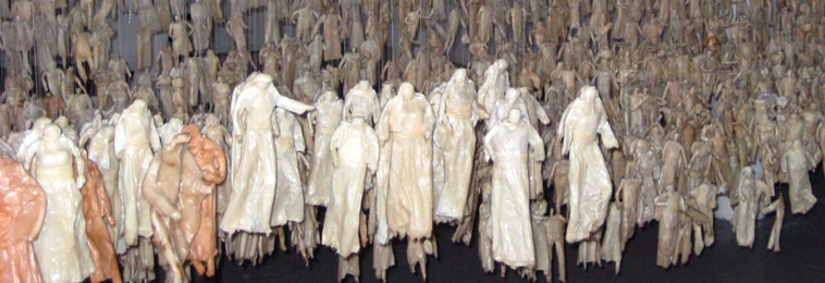 Larger wax figures suspended at the foreground of Return of the Soul