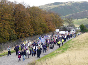 Weary marchers winding up Calton Hill, as seen from above