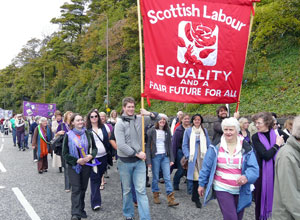 Young people holding a banner reading "Scottish Labour: Equality and a fair future for all"