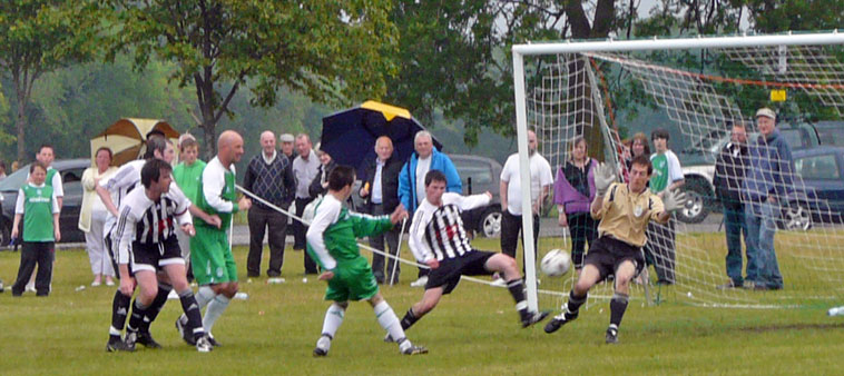 Leith Athletic defending against a Hibs strike