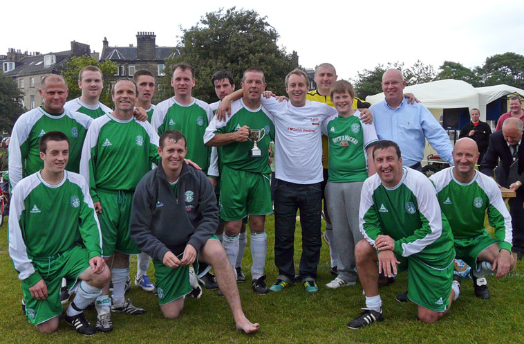 Peter's son Darren, and grandson Dylan with the  victorious Hibs Legends 