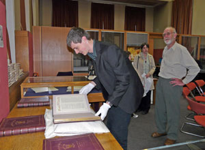 Dave Clarke enthusiast for the Queens Edinburgh Rifles examines the Roll