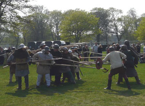 Pikemen in formation against a row of swordsmen