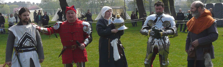 Three eras of armoury represented by the Crusading Period, the Age of the 100 years war and a  Tudor Age full metal armour