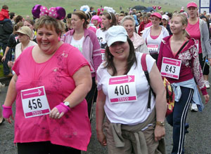 Women in pink walking