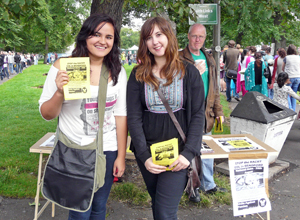 Young women holding up flyers to advertise the Bradford rally against the fascist group, English Defence League