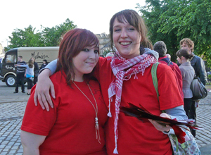 Two young women in red t-shirts