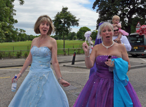 Two women in sky blue and purple ball gowns