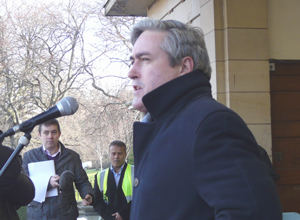 Iain Gray speaking in dark blue winter coat