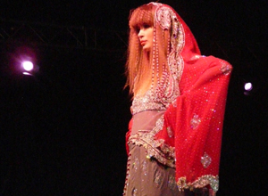 Woman in red and silver Spanish Lady style shawl and dress