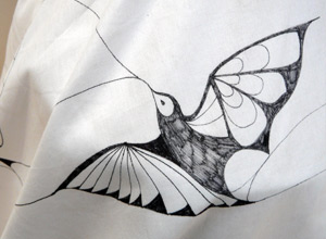 Illustration of a flying hummingbird in black on white material