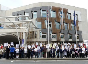 ... holding their Save Meadownbank: Well done Chris placards